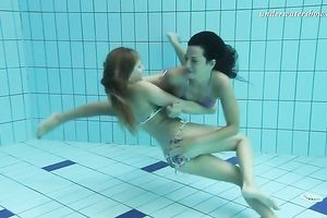 Two new European hawt nubiles underwater showing bodies