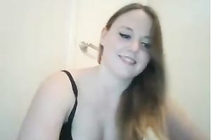 Buxom honey fingering her cookie in front of camera