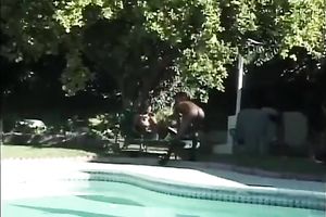 Muff diving time with 2 cute swarthy lesbies over the poolside