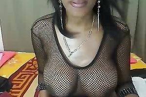 Amateur large breasted dark black cock slut was posing in her fishnet stuff on web camera