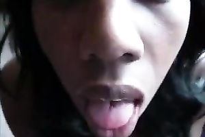 Fat lips of one ebon engulfing head slips pole up and down