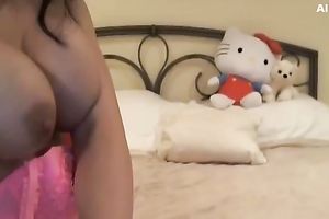Incredible bimbo with large milk sacks fingers herself in the ass