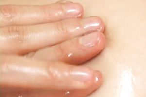 Sensual and sexy Japanese teen hottie oiled up and teased