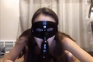 Beautiful masked legal age teenager riding large sex toy in non-professional masturbation movie scene