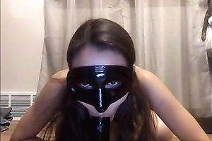 Beautiful masked legal age teenager riding large sex toy in non-professional masturbation movie scene