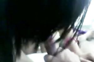 Asian legal age teenager riding hard 10-Pounder in a cowgirl position