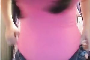 Buxom sweetheart with cute hairstyle shows her goodies on cam