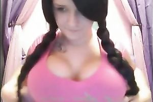 Buxom sweetheart with cute hairstyle shows her goodies on cam