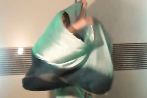 Well shaped girlie dancing seductively in eastern costume