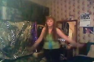 Mature redhead lady just fooling on the web camera in her room