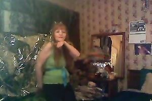 Mature redhead lady just fooling on the web camera in her room