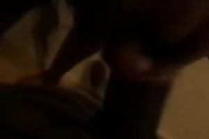 Bosomy ebony girlfriend in the black eating my pecker