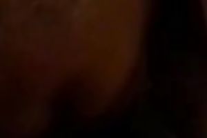 Bosomy ebony girlfriend in the black eating my pecker