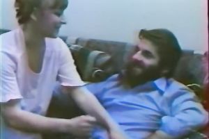 Brunette classic cutie gives head and bows over on the sofa