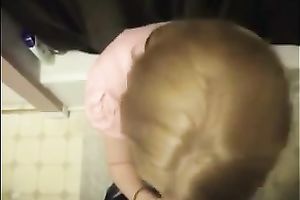 Cute colleague in her office suit sucks and swallows