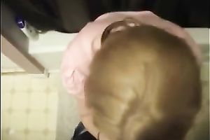 Cute colleague in her office suit sucks and swallows