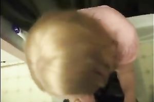 Cute colleague in her office suit sucks and swallows