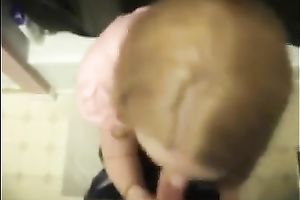 Cute colleague in her office suit sucks and swallows