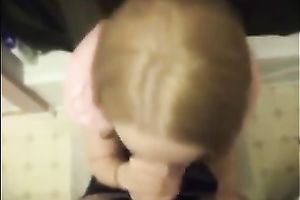 Cute colleague in her office suit sucks and swallows