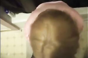 Cute colleague in her office suit sucks and swallows