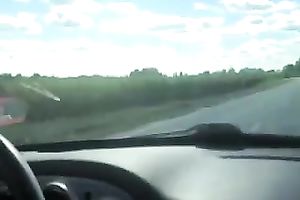 My girlfriend is giving me a cook jerking during a road travel