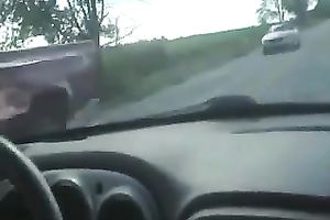 My girlfriend is giving me a cook jerking during a road travel