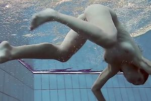 Hot pale skin new hottie from Europe disrobes underneath water