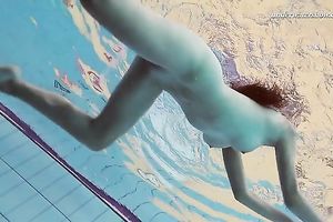 Hot pale skin new hottie from Europe disrobes underneath water