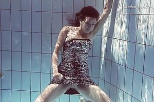 Hot pale skin new hottie from Europe disrobes underneath water