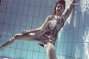 Hot pale skin new hottie from Europe disrobes underneath water