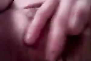 My nasty British girlfriend fingers her taut bushy quim on selfie