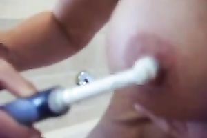 My tempting breasty girlfriend pleases herself with electric toothbrush
