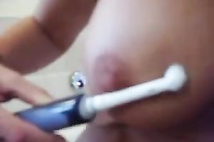 My tempting breasty girlfriend pleases herself with electric toothbrush