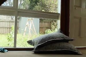 Red haired non-professional nympho was sitting on the windowsill during the time that teasing herself