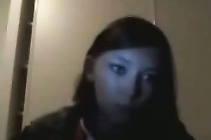 Teen flashes her bumpers in a black room on web web camera to her BF
