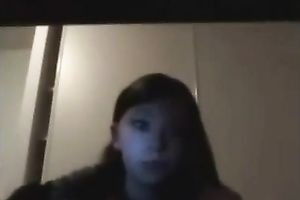 Teen flashes her bumpers in a black room on web web camera to her BF