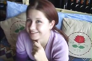 Redhead white cutie doesn't mind engulfing schlong right now