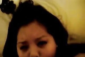 Asian overweight whore blows my hard dong greedily