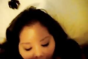 Asian overweight whore blows my hard dong greedily