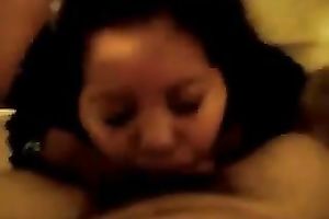 Asian overweight whore blows my hard dong greedily