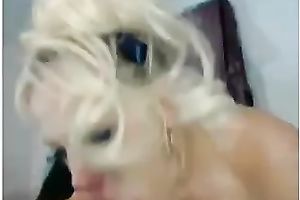 Curly blonde haired webcam beauty with fine milk cans was engulfing her dildo