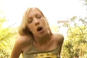 Skanky blond legal age teenager bonks an aged fellow in the woods