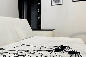 Blue eyed legal age teenager with tiny milk cans is engulfing her fake penis like a lollipop