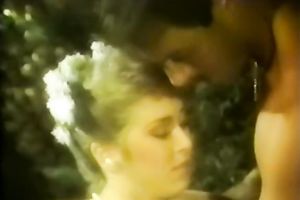 Adorable classic dark brown sucking petite prick by the lake