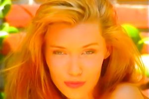 Skinny and juvenile model in white concupiscent costume stripteases