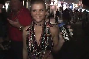 Crazy party angels show off their goodies in the street