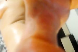 Auburn white bitch with cute curls strips just to cover her body with oil