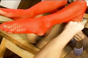 Slut in fishnets shows her oral stimulation and footjob skills to a chap