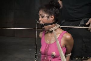 Slim leggy black skinned blowlerina is fastened up and throat screwed