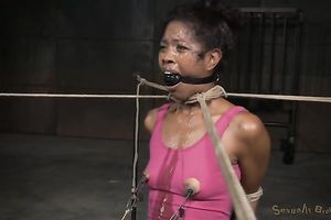 Slim leggy black skinned blowlerina is fastened up and throat screwed